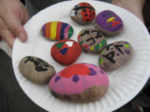 Plate full of painted rocks